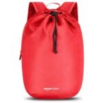 amazon basics 15L Red Backpack | Lightweight & Durable Polyester | Drawstring Closure | 2 Compartments for Essentials | Unisex for Unisex | Daily Commutes, City Travel & Short Trips (Red)